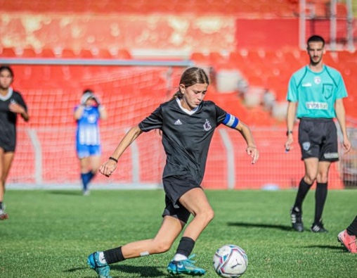 Amit wearing the captain's armband